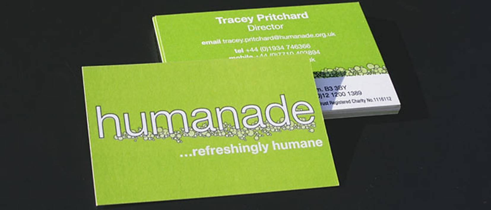 humanade business cards on black background